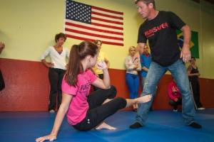 Todd with assistant Lindsey Collins demonstrating RunSafer ground technique